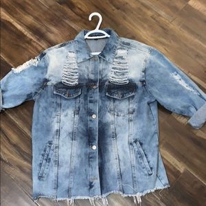 Distressed denim jacket